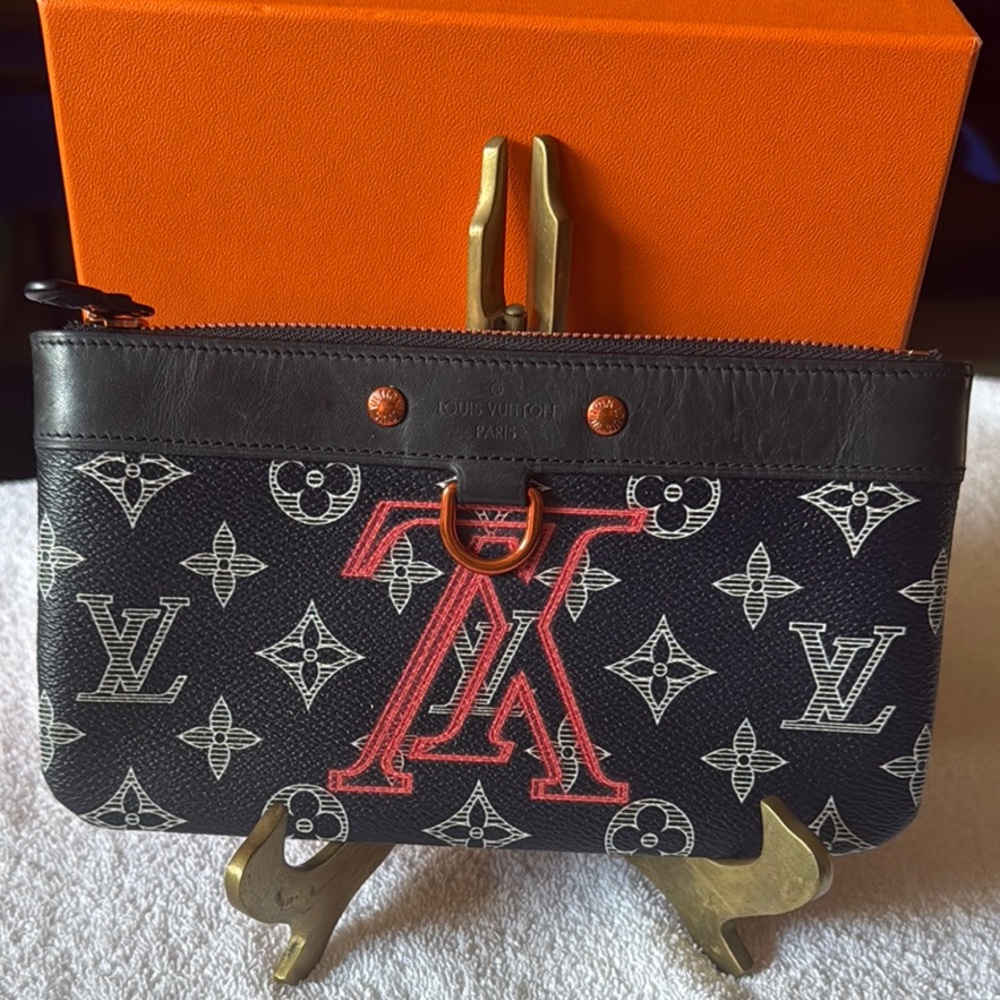 Louis Vuitton Discovery Pochette Limited Edition Upside Down Mono 8" L x 4.25" H